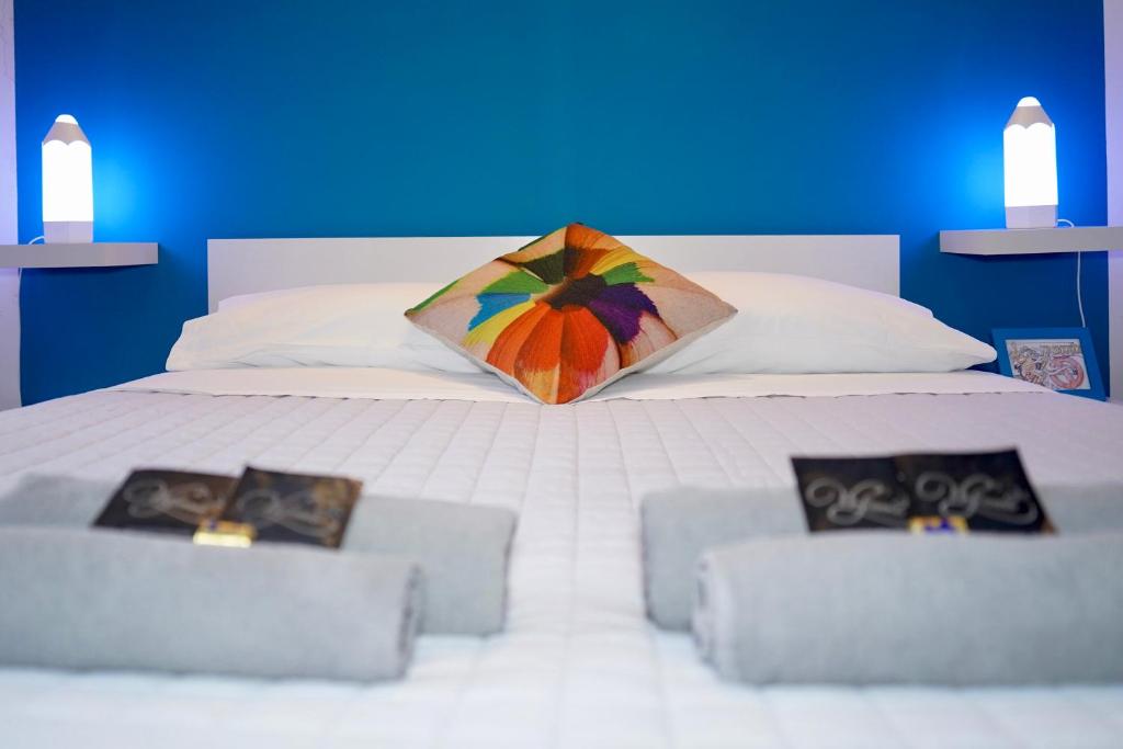 Posteľ alebo postele v izbe v ubytovaní B&B Arts And Music