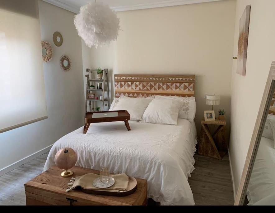 Postel nebo postele na pokoji v ubytování PRECIOSO APARTAMENTO EN EL CENTRO DE BENIDORM