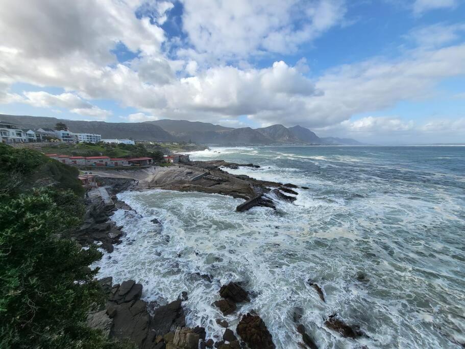 an aerial view of a beach with the ocean at *Self-Check in - Whale Watching Paradise -Central* in Hermanus