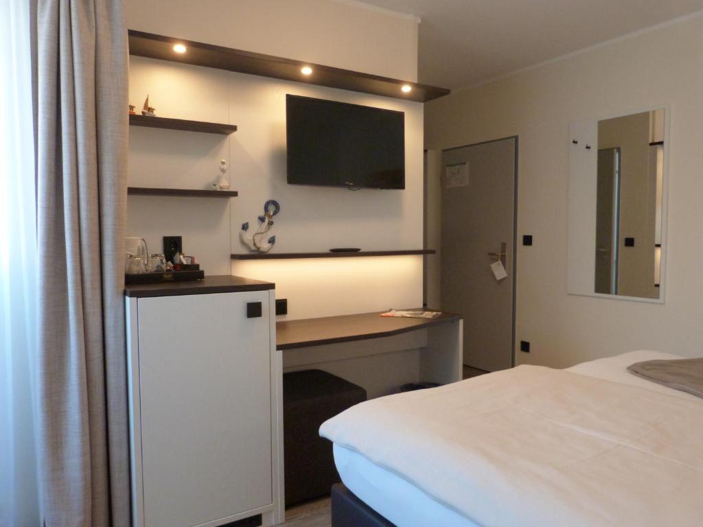Kuchyň nebo kuchyňský kout v ubytování ankerplatz-Hotel garni