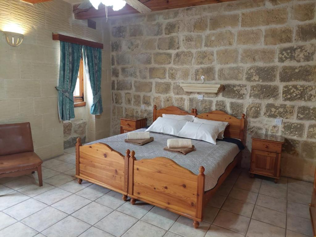 Postel nebo postele na pokoji v ubytování MJ Farmhouse B&B