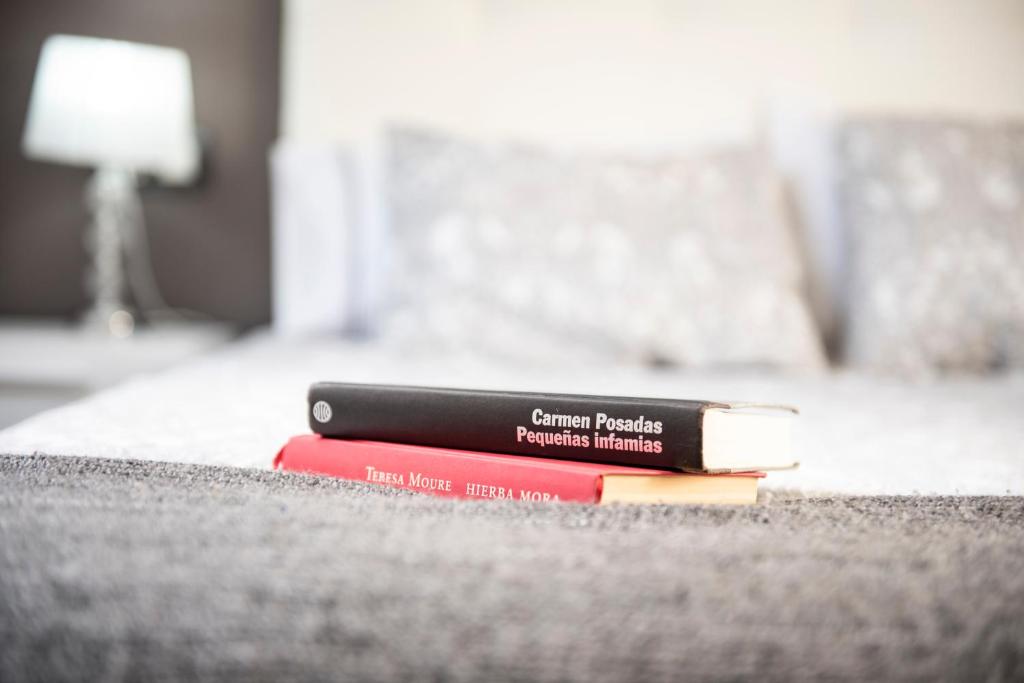 Łóżko lub łóżka w pokoju w obiekcie Apartamento Cuatro Caminos