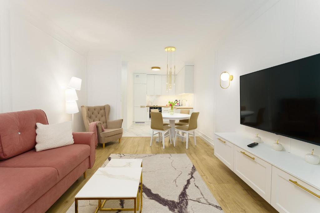 TV a/nebo společenská místnost v ubytování Aquabaltic Apartments Aquarius II