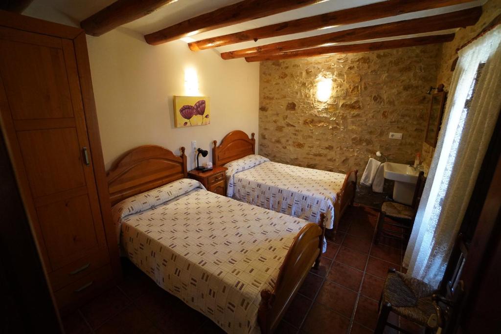 Postel nebo postele na pokoji v ubytování La Posada