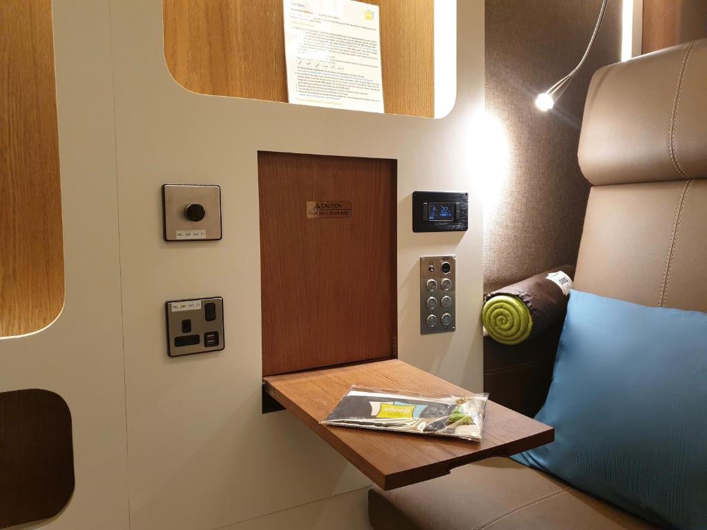 Posezení v ubytování sleep 'n fly Sleep Lounge, NORTH Node - TRANSIT ONLY