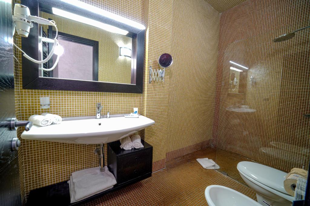 Koupelna v ubytování Amareclub Baia Dei Turchi Resort - Adults Only