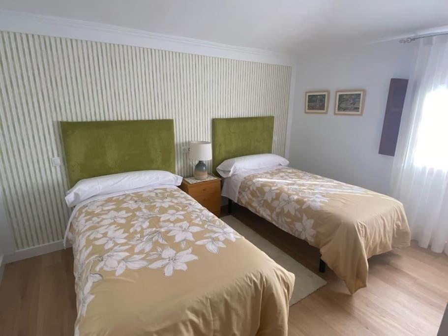 Кровать или кровати в номере La Reposada