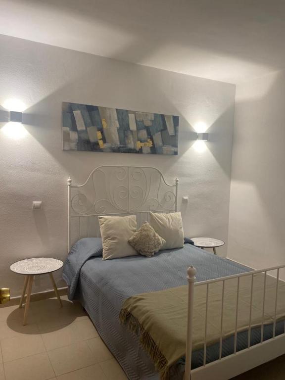 Łóżko lub łóżka w pokoju w obiekcie Apartamento Exclusivo en Sevilla