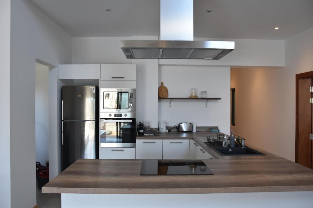 Kuchyň nebo kuchyňský kout v ubytování Cap Sud Apartment