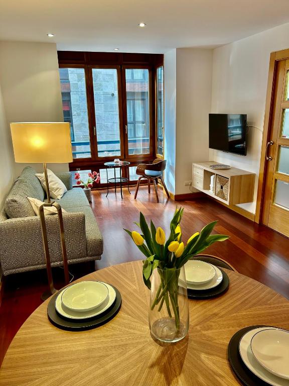 TV a/nebo společenská místnost v ubytování Yalta Apartments
