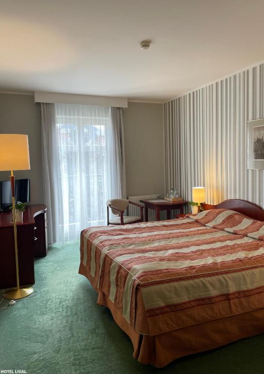 Posteľ alebo postele v izbe v ubytovaní Hotel Lival