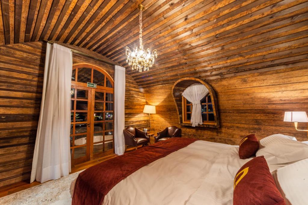 Postel nebo postele na pokoji v ubytování Divisa Experience Resort