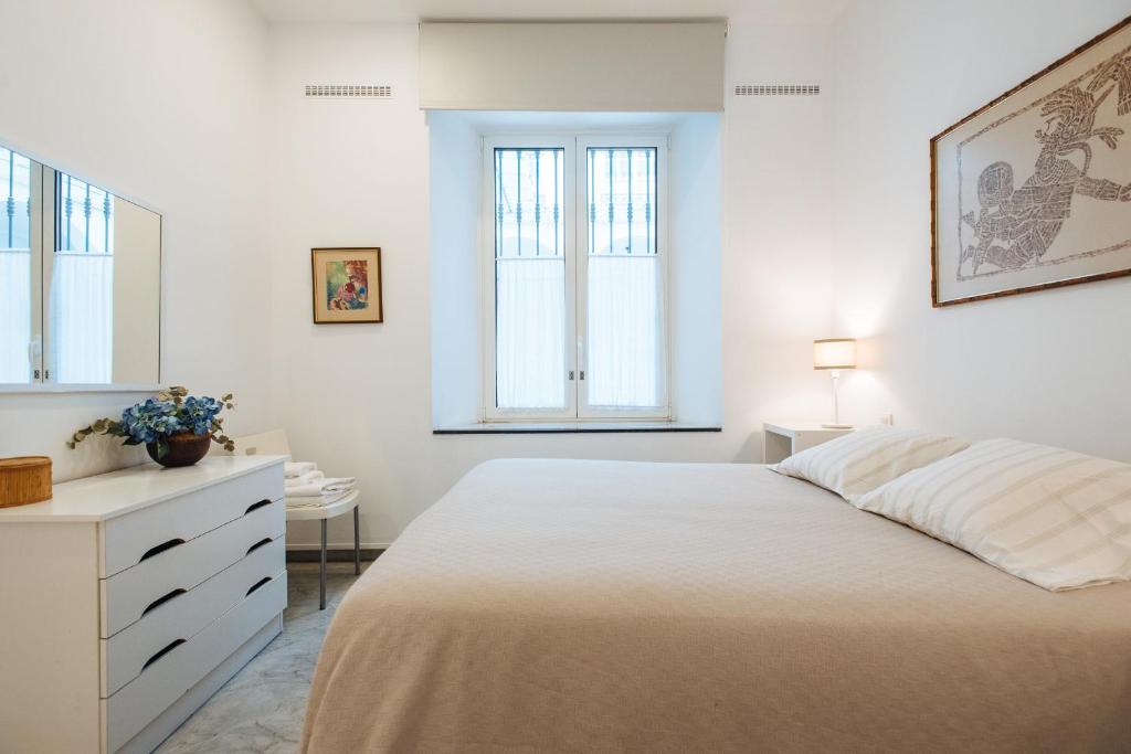 Łóżko lub łóżka w pokoju w obiekcie Apartamento cerca de la catedral