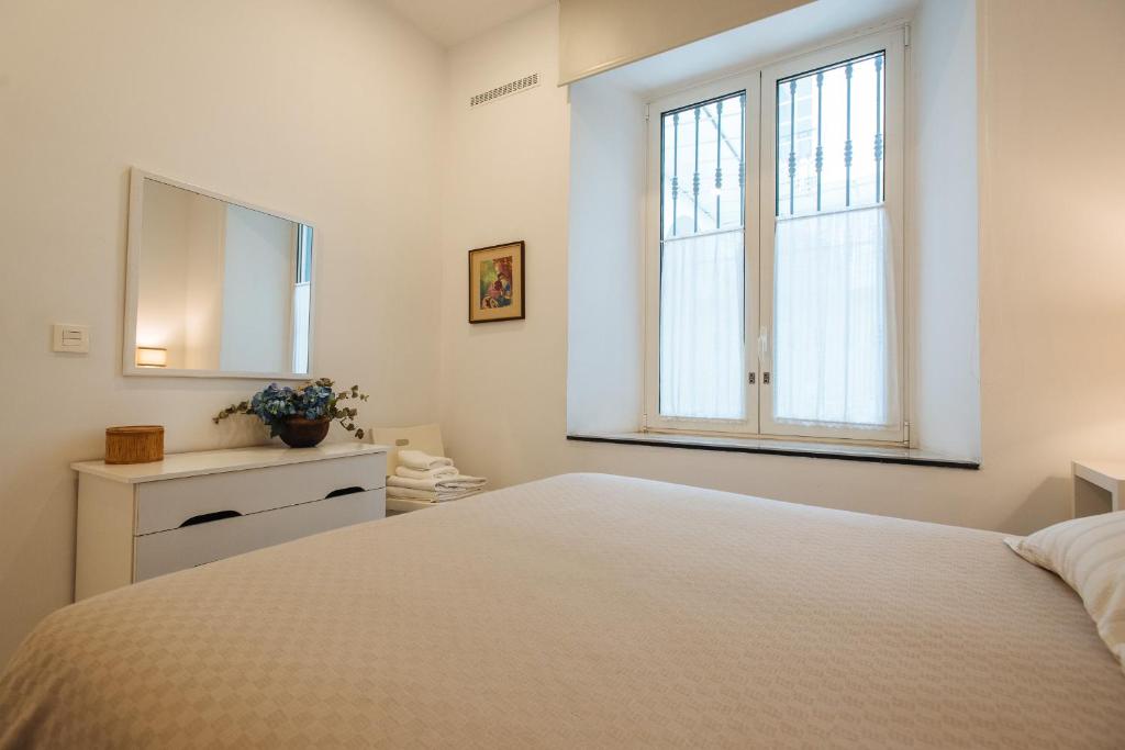 Łóżko lub łóżka w pokoju w obiekcie Apartamento cerca de la catedral