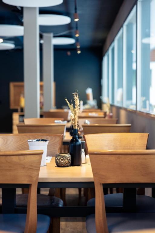 Restoran või mõni muu söögikoht majutusasutuses Hotel Mountime