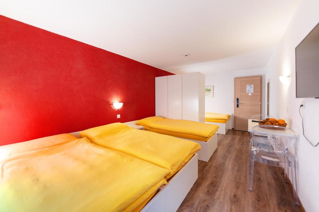 Voodi või voodid majutusasutuse Hotel Mountime toas