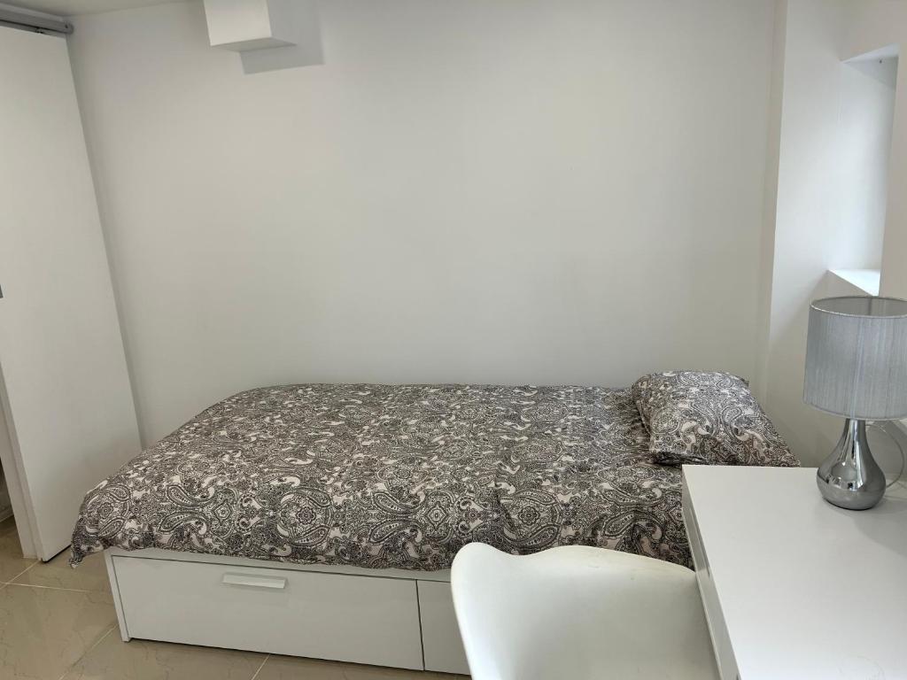 Posteľ alebo postele v izbe v ubytovaní Chambre 14m2