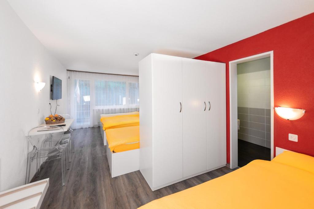 Voodi või voodid majutusasutuse Hotel Mountime toas
