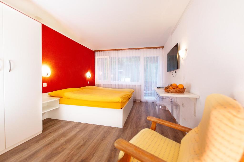 Voodi või voodid majutusasutuse Hotel Mountime toas