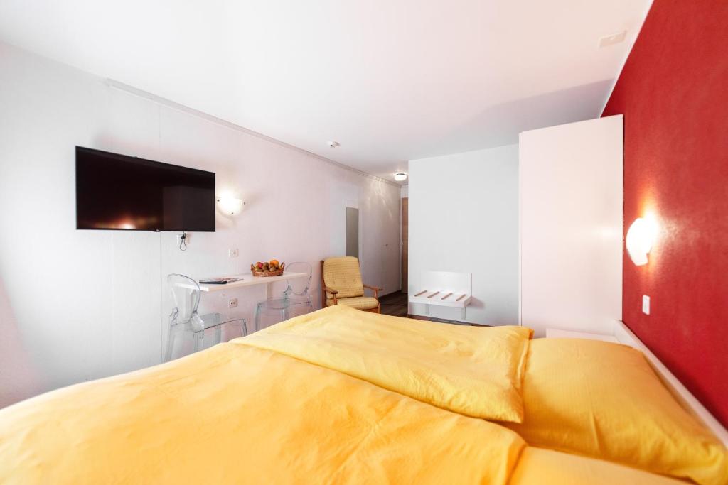 Voodi või voodid majutusasutuse Hotel Mountime toas