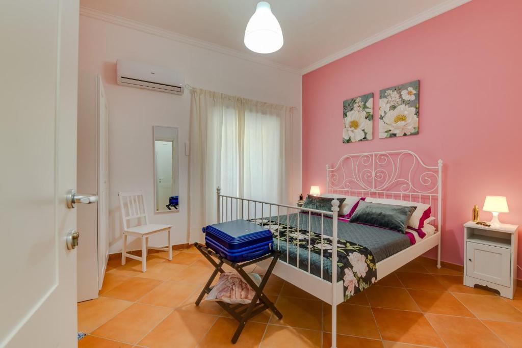 Postel nebo postele na pokoji v ubytování Namuri Rooms