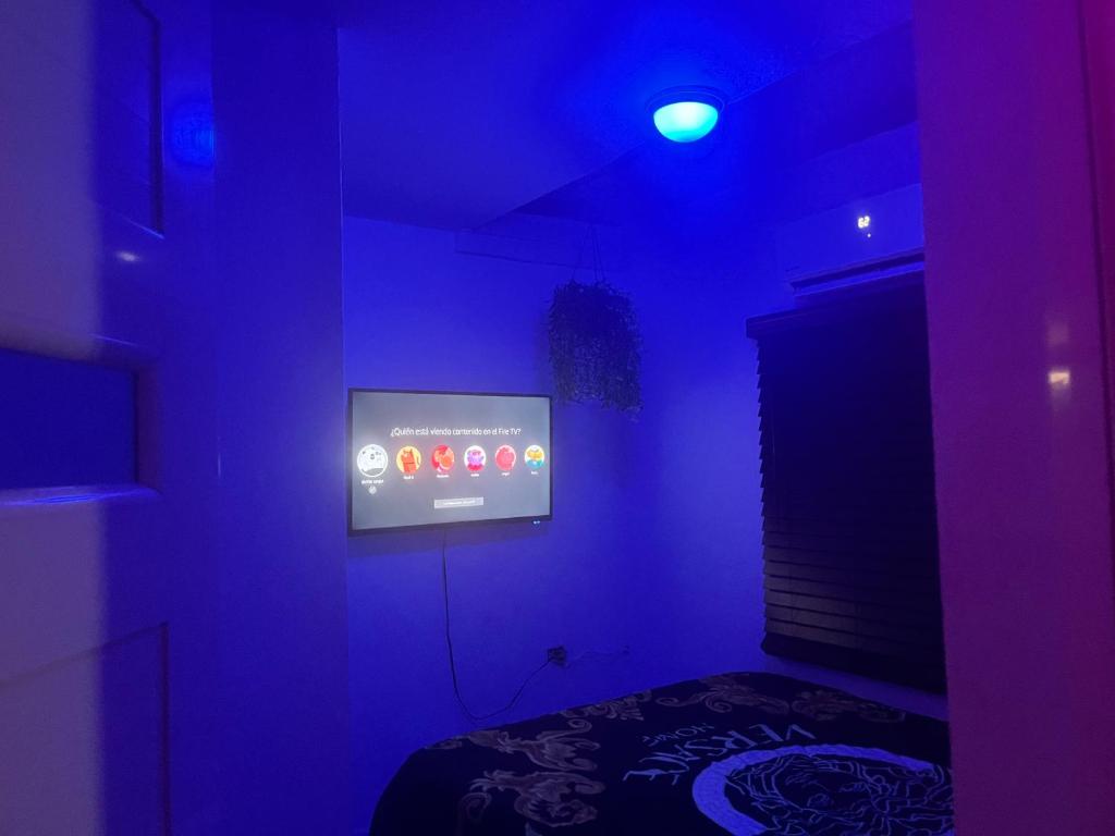 TV a/nebo společenská místnost v ubytování Satisfaction