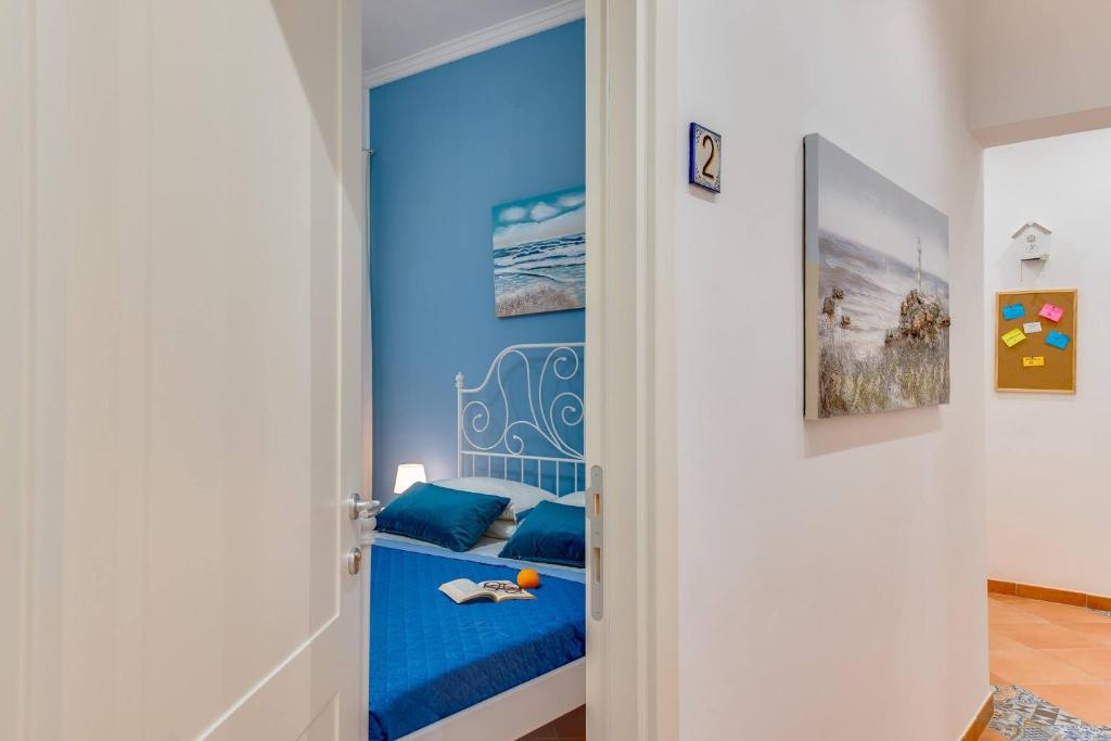 Postel nebo postele na pokoji v ubytování Namuri Rooms