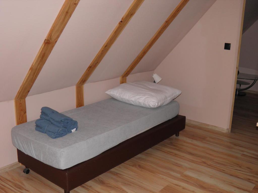 Łóżko lub łóżka w pokoju w obiekcie Apartament Rynek 30