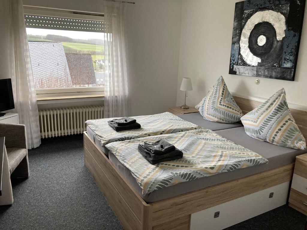 Postel nebo postele na pokoji v ubytování Bed & Breakfast Weisser Stein