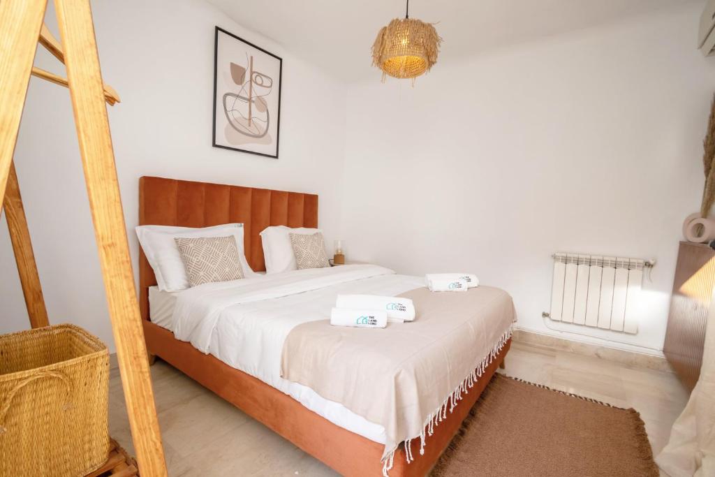 Postel nebo postele na pokoji v ubytování Villa bord de mer piscine chauffée et terrasse