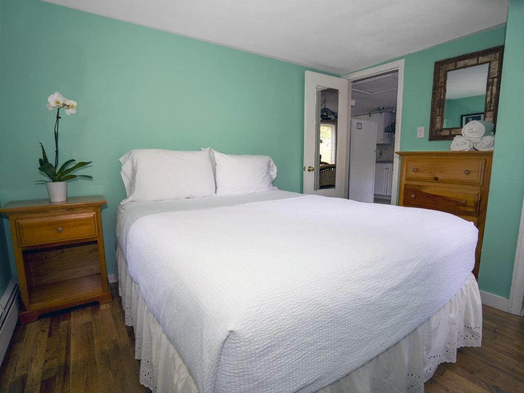 Postel nebo postele na pokoji v ubytování Hamptons Vacation Inn