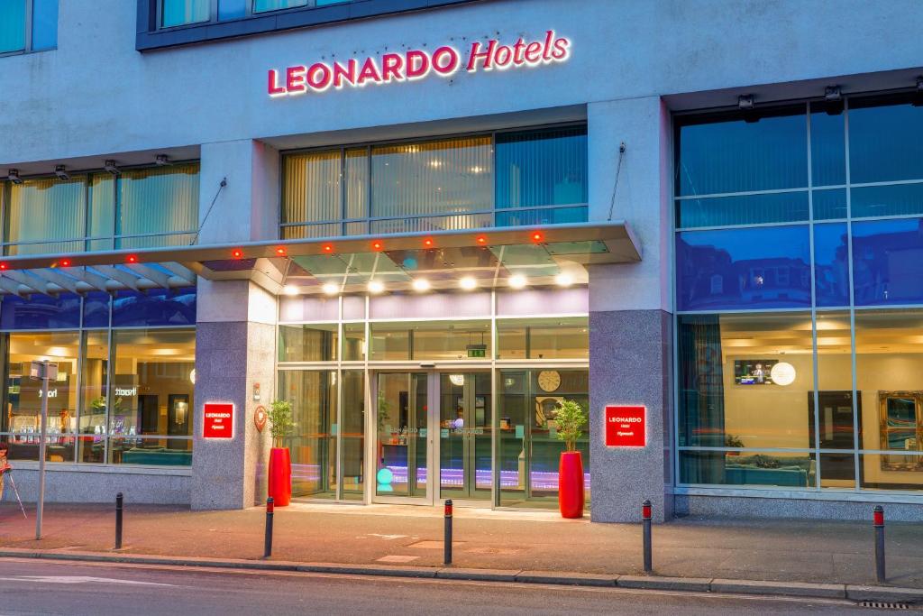 a store front of a building with a sign on it at Leonardo Hotel Plymouth in Plymouth