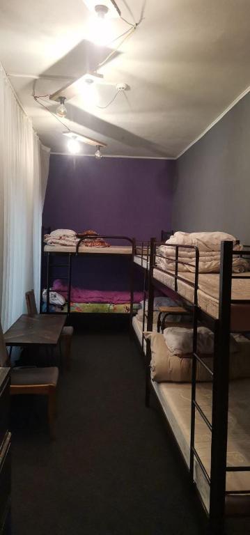 Postel nebo postele na pokoji v ubytování Kosher Hostel