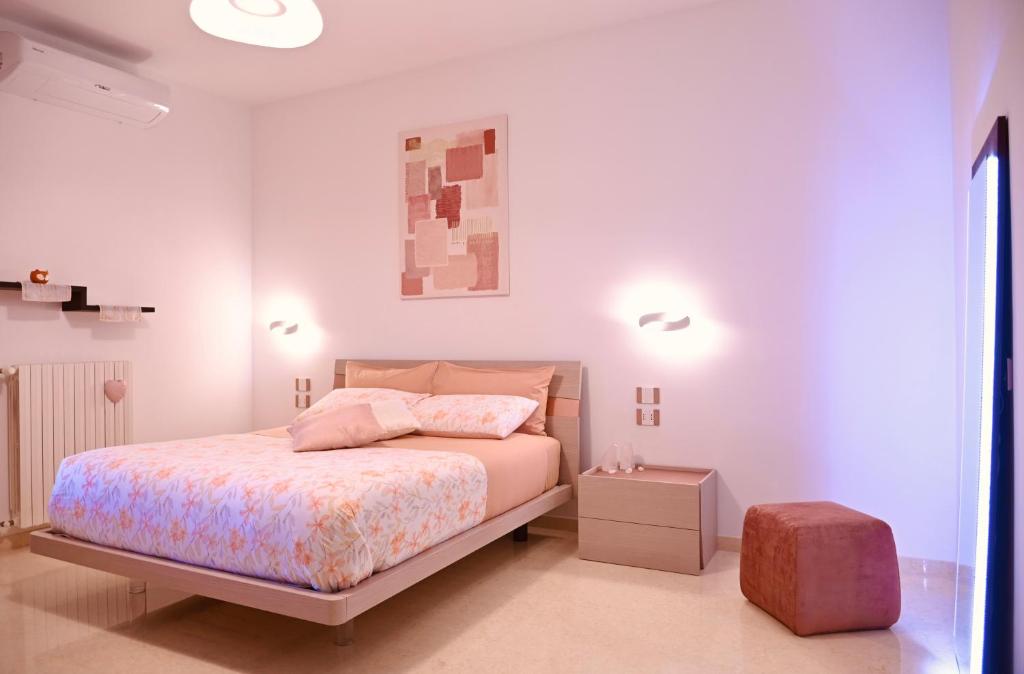 Postel nebo postele na pokoji v ubytování B&B 5 Lune