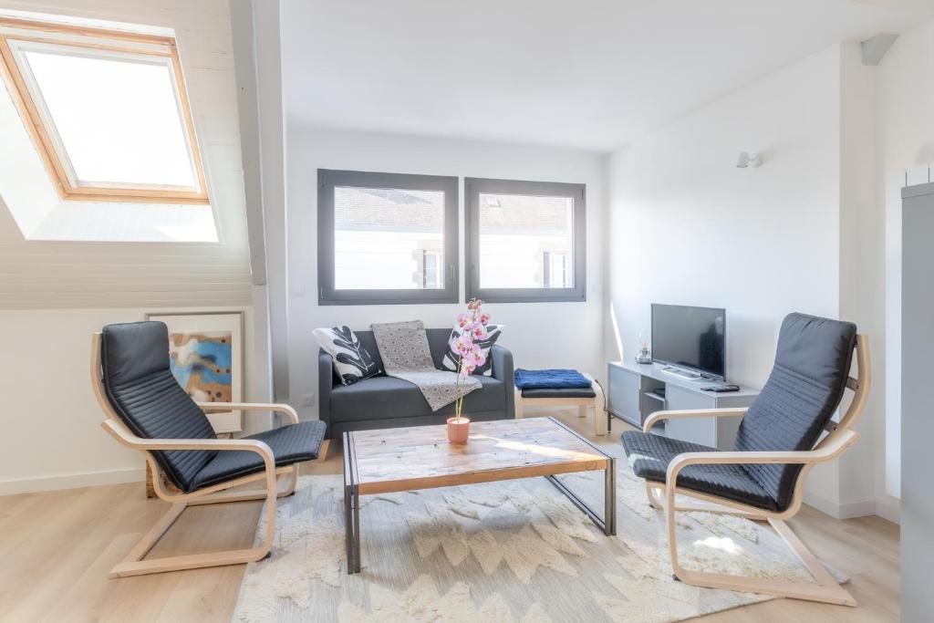Posedenie v ubytovaní Appartement neuf & tout confort - Proche Centre ville par Groom