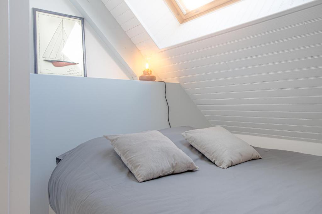 Posteľ alebo postele v izbe v ubytovaní Appartement neuf & tout confort - Proche Centre ville par Groom