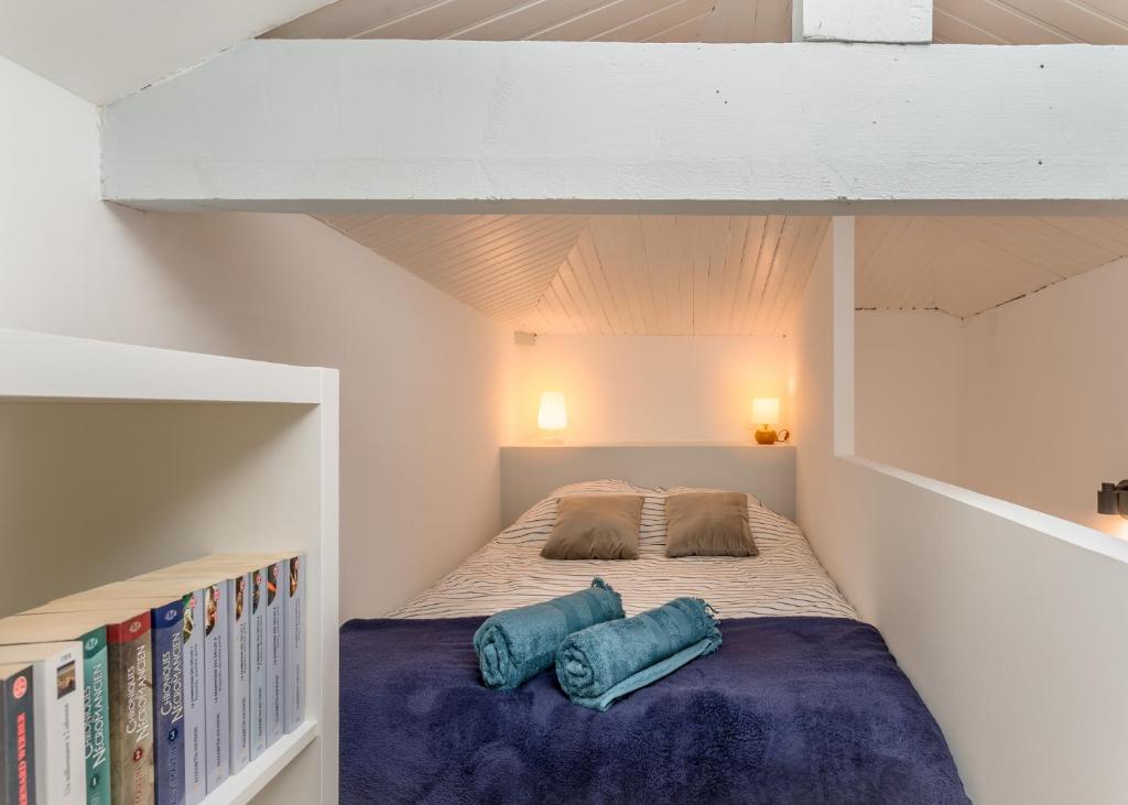 Posteľ alebo postele v izbe v ubytovaní Appartement neuf & tout confort - Proche Centre ville par Groom