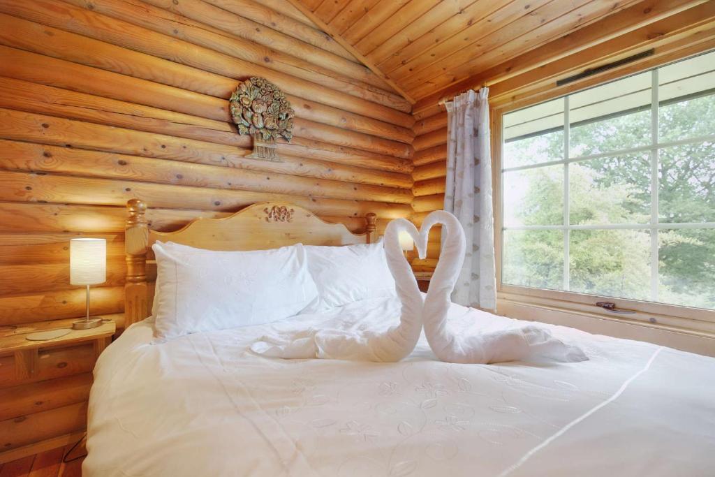 Postel nebo postele na pokoji v ubytování Faweather Grange