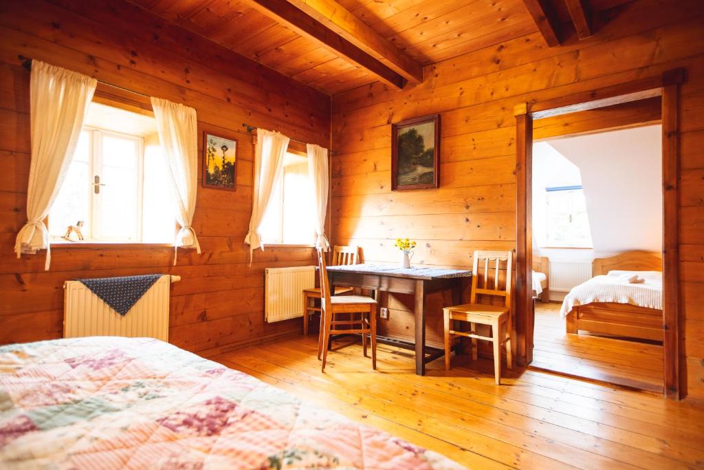 Postel nebo postele na pokoji v ubytování Penzion Na Stodolci