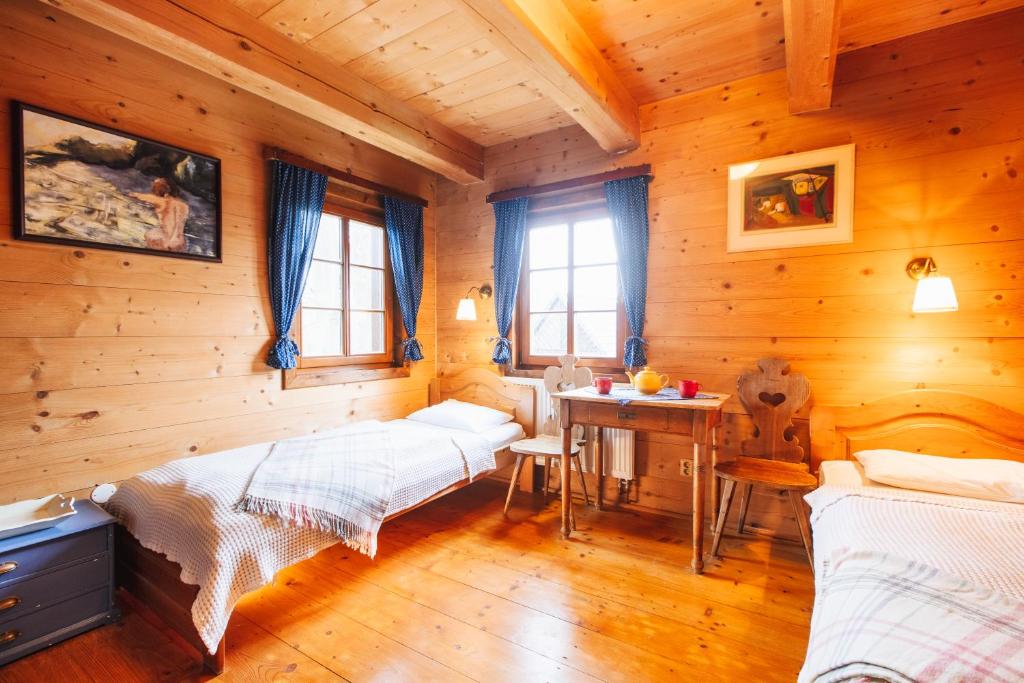 Postel nebo postele na pokoji v ubytování Penzion Na Stodolci