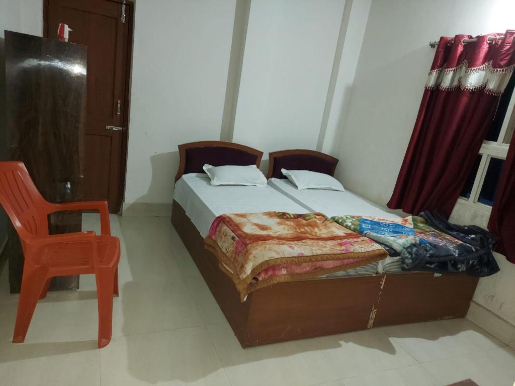 Postel nebo postele na pokoji v ubytování Rama Guest House