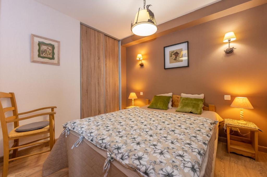 Posteľ alebo postele v izbe v ubytovaní Appartement 6 couchages au pied des pistes à Orcières 2 chambres, balcon et parking couvert