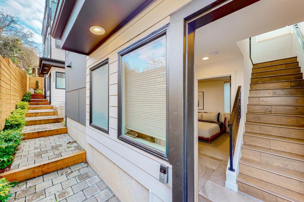 a house with a window and a bedroom at Northlake Nirvana in Seattle