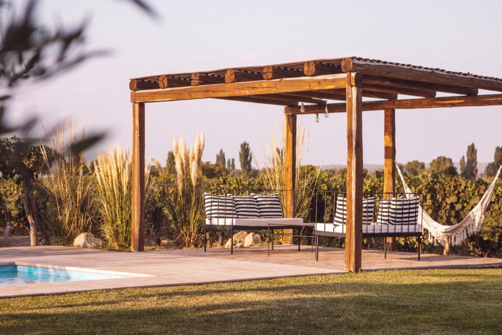 Bazén v ubytování Posada Finca Garciarena nebo v jeho okolí
