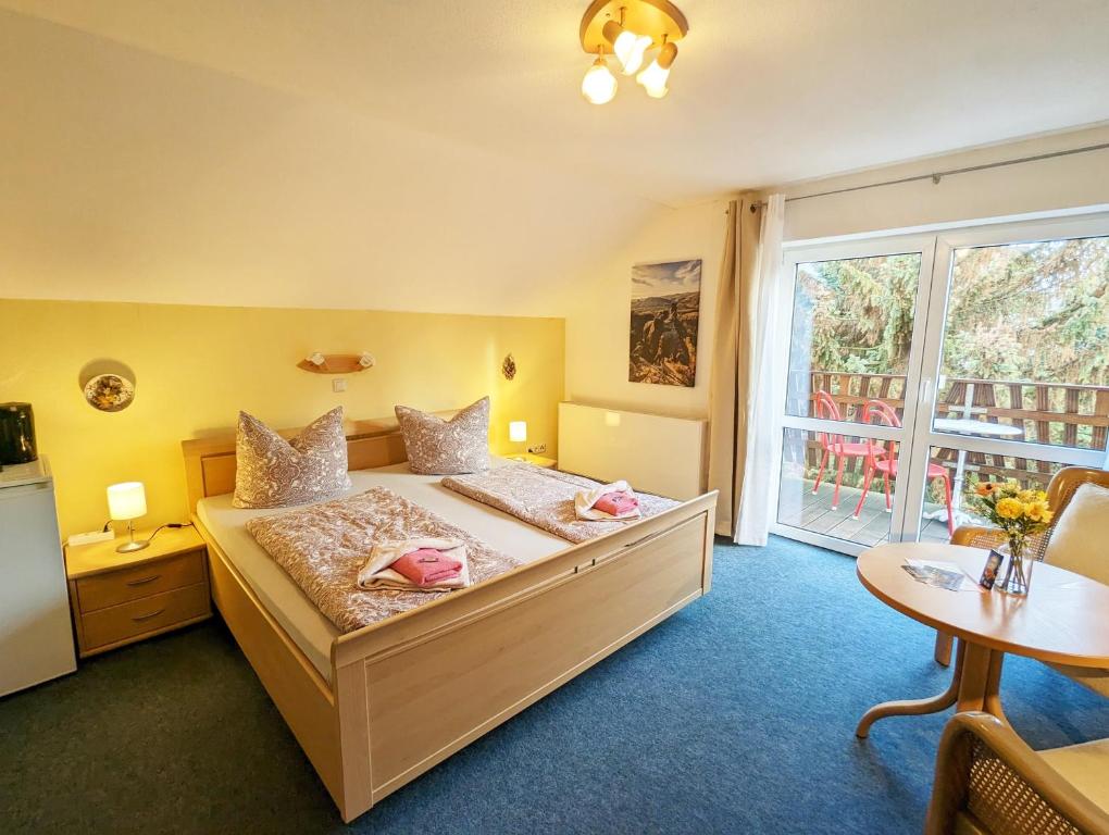 Postel nebo postele na pokoji v ubytování L9 - Urlaubsmagie - Balkon & direkt am Wanderweg