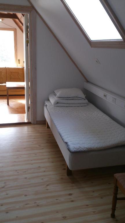 Postel nebo postele na pokoji v ubytování Loft Ålaryd