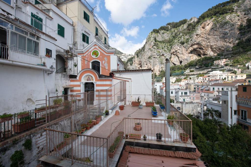 a view from a balcony of a building at Vittoria House Centro Storico in Amalfi