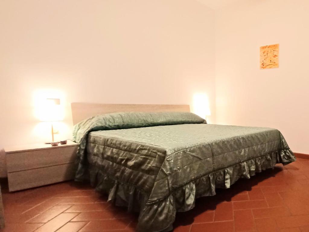 Katil atau katil-katil dalam bilik di Casa Chianti