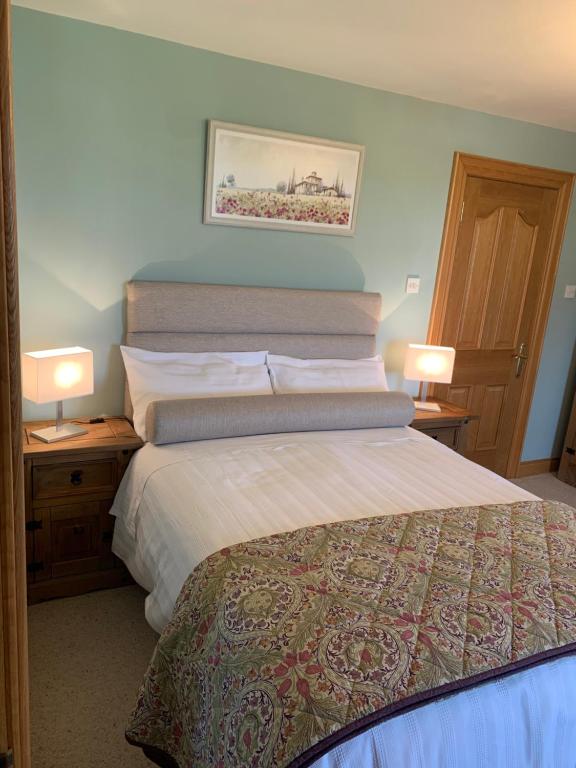Postel nebo postele na pokoji v ubytování Mayrone House B&B