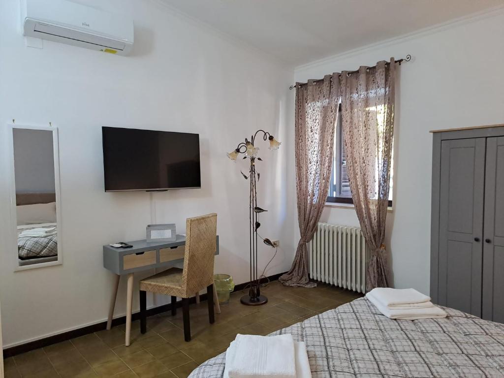 TV a/nebo společenská místnost v ubytování Relais LaValle